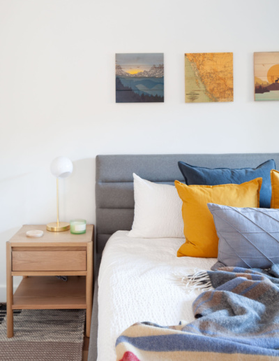 Bedroom with large window and mountain views in Whistler Passive House
