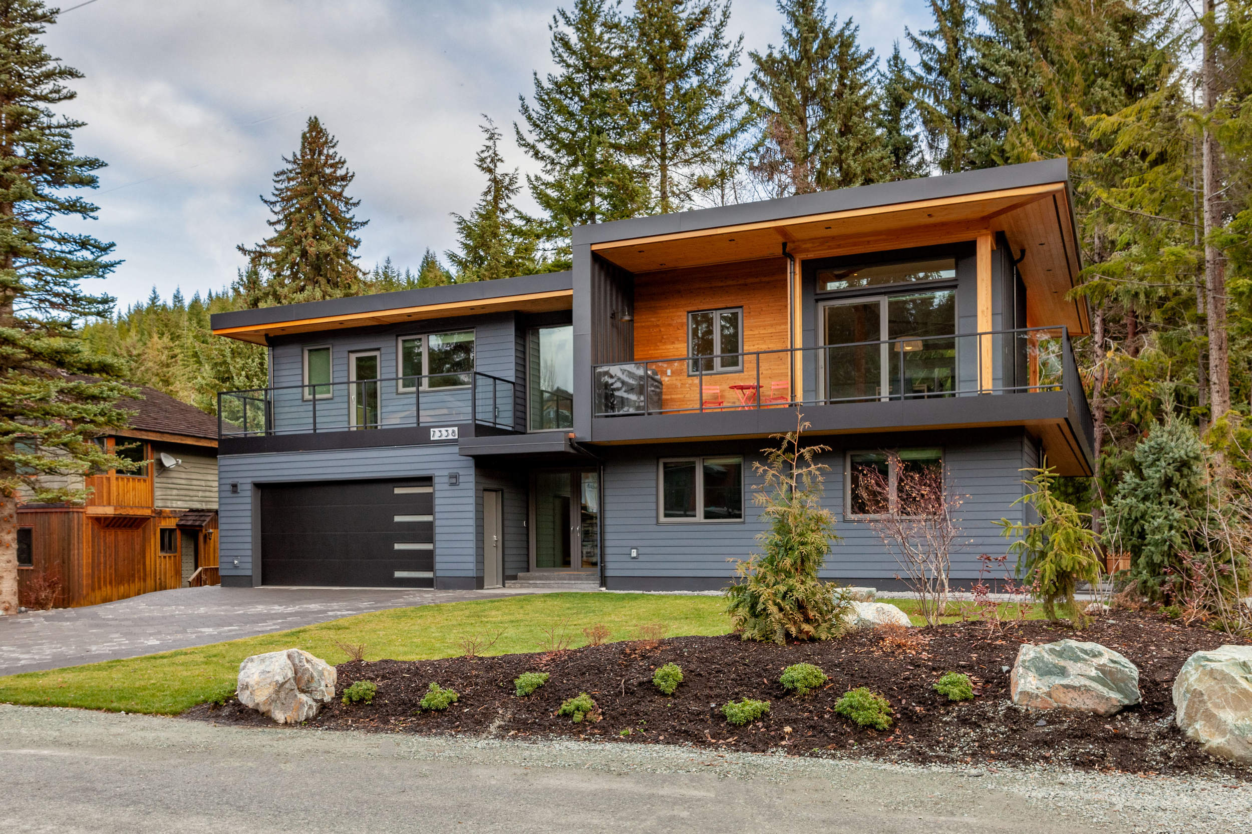 Front Exterior with Landscaping - Whistler Central Modern Whistler home exterior with professional landscaping and mountain backdrop